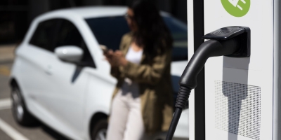 side-view-blurry-woman-waiting-near-car